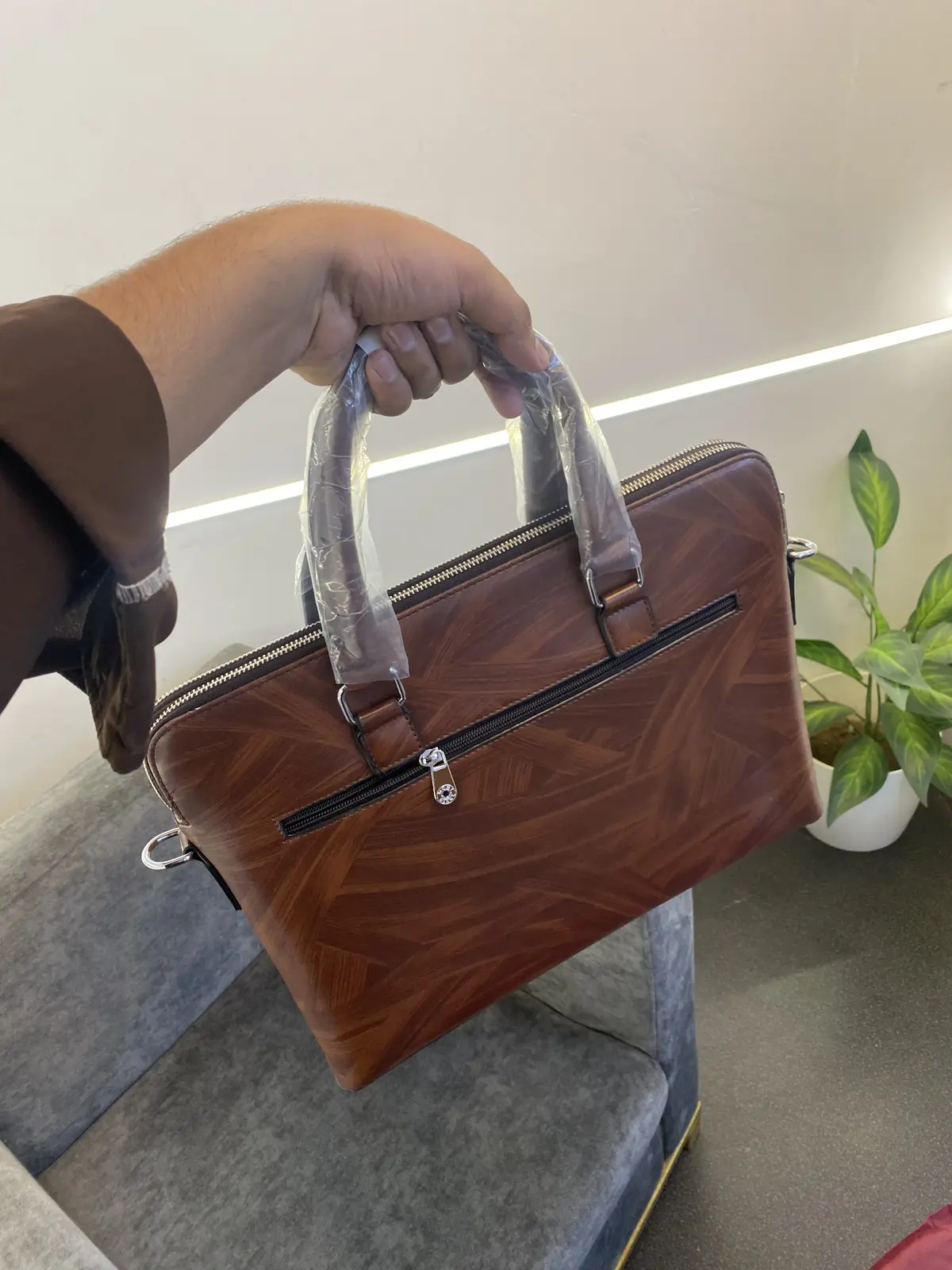 Montblan c Wooden leather finish imported laptop bag with double zip and back zip and brand strap brown - Image 4