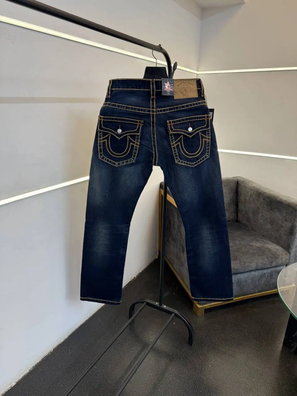 True religion hyperflex blue imported denim with brand button and pattern on back - Image 3