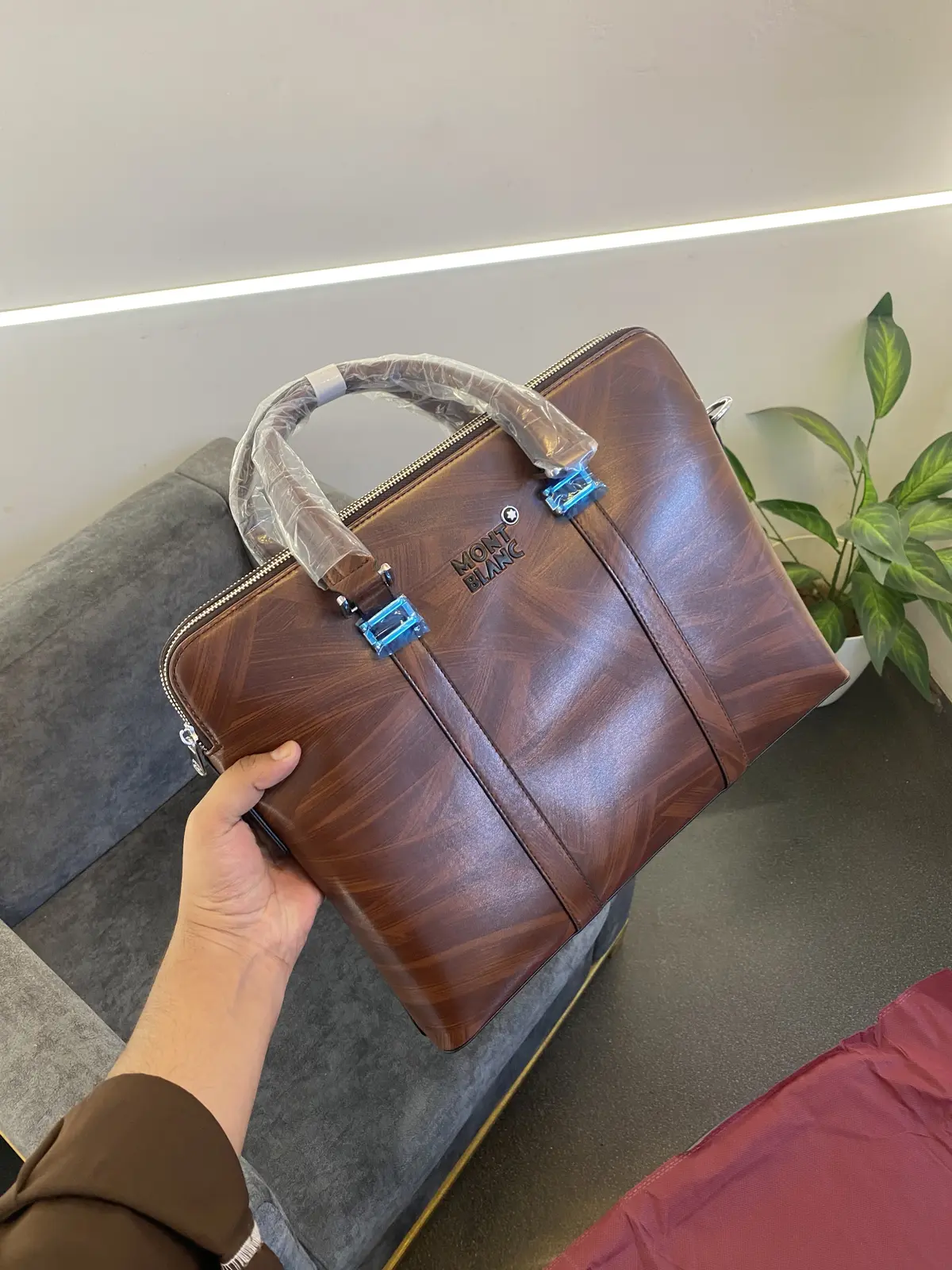 Montblan c Wooden leather finish imported laptop bag with double zip and back zip and brand strap brown - Image 2