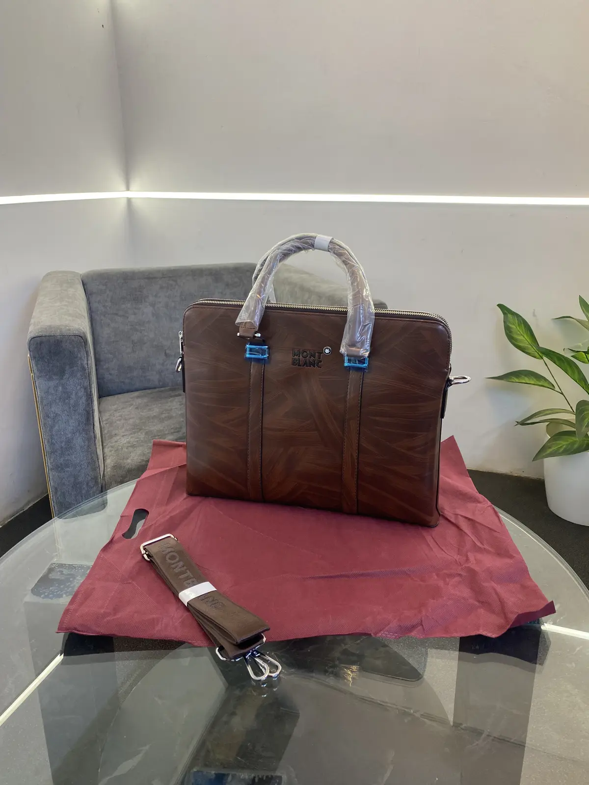 Montblan c Wooden leather finish imported laptop bag with double zip and back zip and brand strap brown