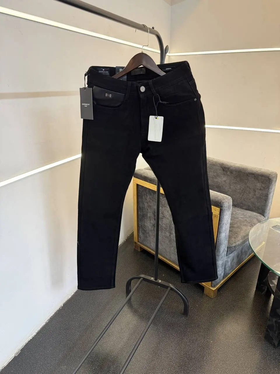 Givench y Jet black imported denim with brand buttons and pockets