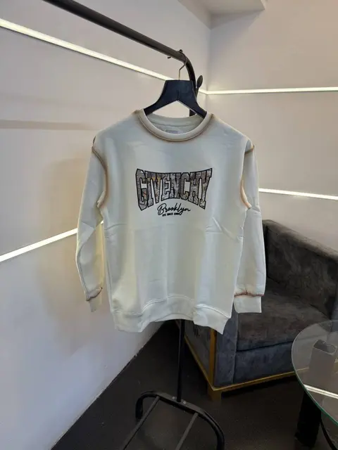 Givenchy imported fleece sweatshirt with spray print and front branding cream