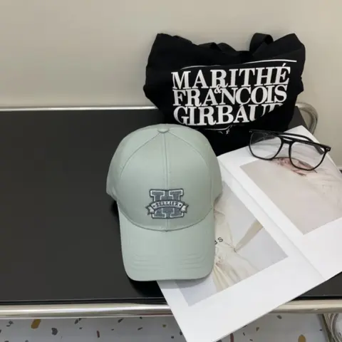 Davis H Sellier Hermez Bluish Green Logo Premium Unisex Cap
