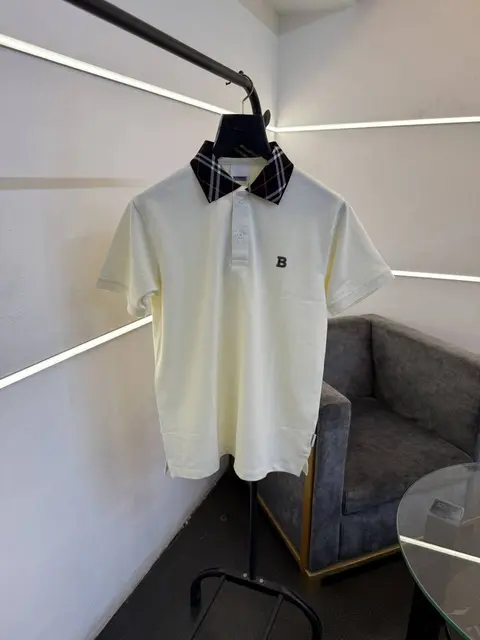 Burberry cream self knitted polo tshirt with multi collar and chest logo