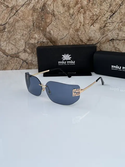 Miu miu gold blue