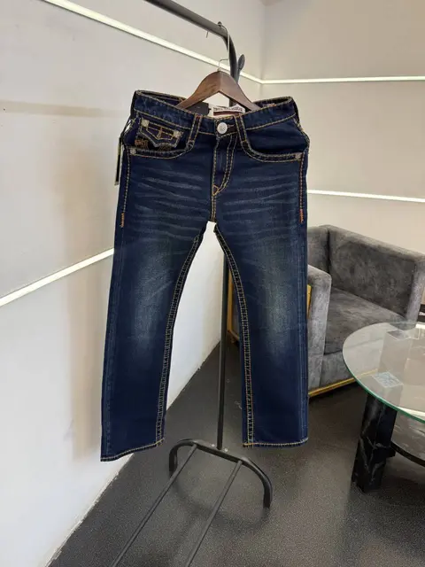 True religion boot cut imported denim with brand buttons and packing