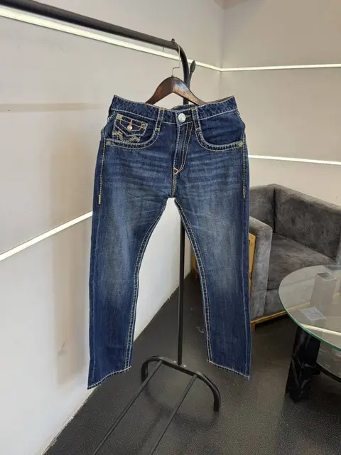 True religion straight fit imported denim with brand buttons and packing